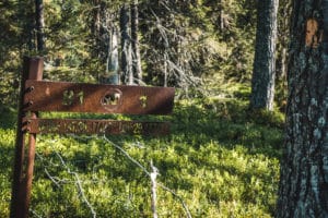 Orange mark and signpost, Hiking Karhunkierros Trail, Finland