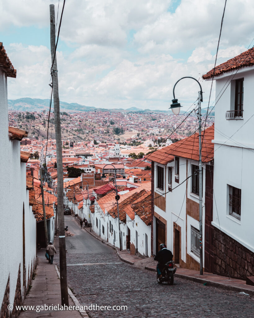 White buildings with orange roofs in Sucre, Bolivia